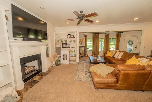 1301 E Rock Creek Rd, Tuttle, OK 73089 - carpeted living area featuring ornamental molding, a fireplace with flush hearth, a ceiling fan, and recessed lighting