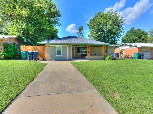 2753 SW 46th Pl, Oklahoma City, OK 73119 - view of front of property with driveway, brick siding, and covered porch