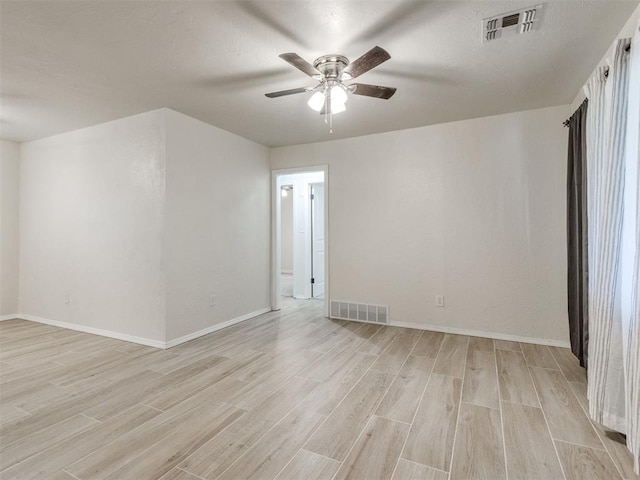2753 SW 46th Pl, Oklahoma City, OK 73119 - empty room featuring light wood-style floors and ceiling fan