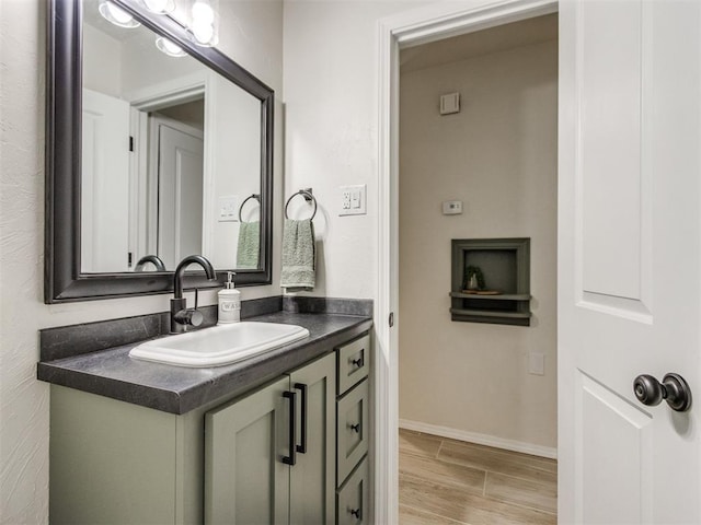 2753 SW 46th Pl, Oklahoma City, OK 73119 - bathroom featuring vanity and wood finished floors