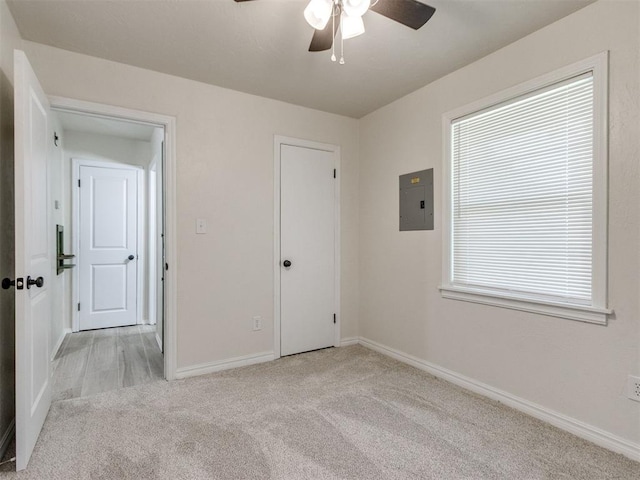 2753 SW 46th Pl, Oklahoma City, OK 73119 - unfurnished bedroom with electric panel, carpet floors, and ceiling fan