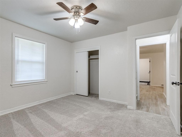 2753 SW 46th Pl, Oklahoma City, OK 73119 - unfurnished bedroom featuring light carpet, a closet, and a ceiling fan
