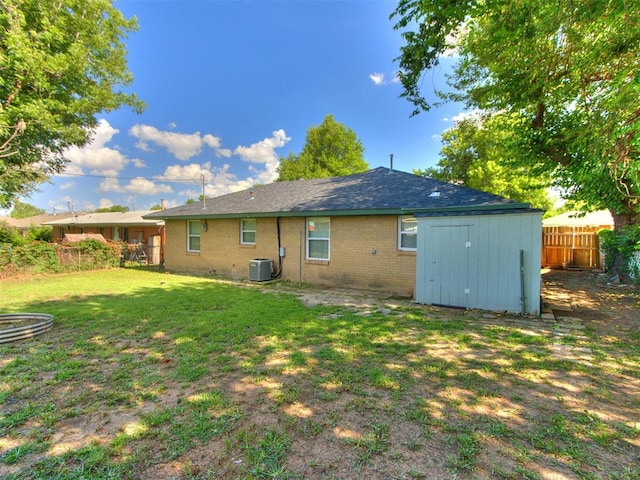 2753 SW 46th Pl, Oklahoma City, OK 73119 - rear view of property with brick siding and a shed