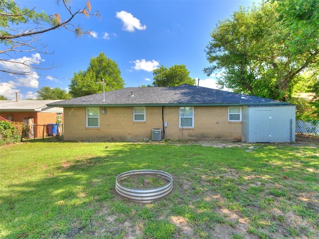 2753 SW 46th Pl, Oklahoma City, OK 73119 - rear view of property with brick siding and a shed