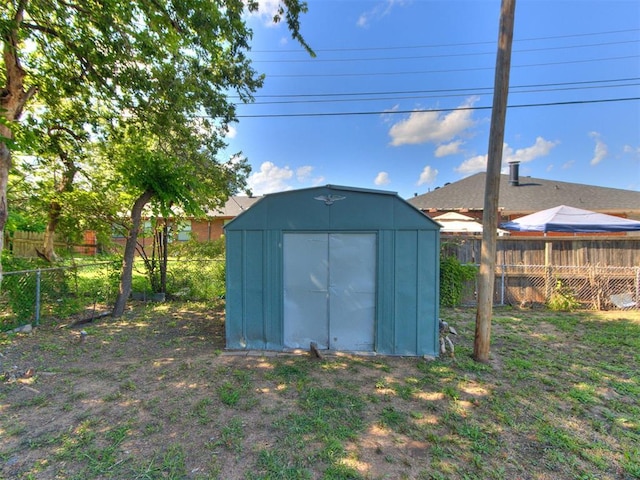 2753 SW 46th Pl, Oklahoma City, OK 73119 - view of shed with a fenced backyard