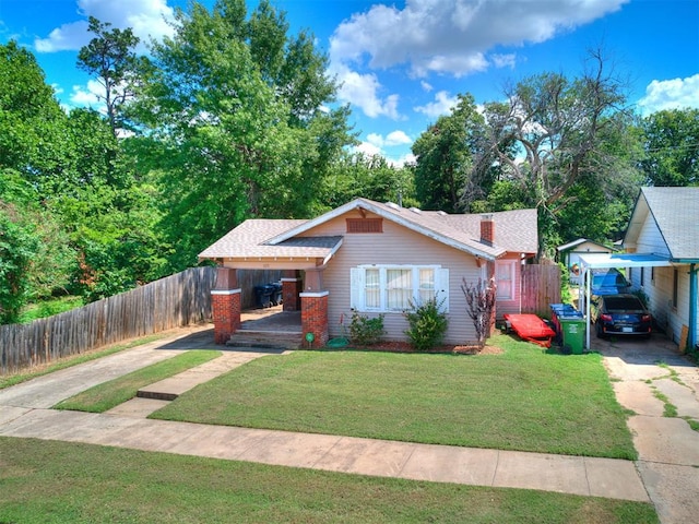 1122 NW 42nd St, Oklahoma City, OK 73118 - bungalow with concrete driveway and roof with shingles