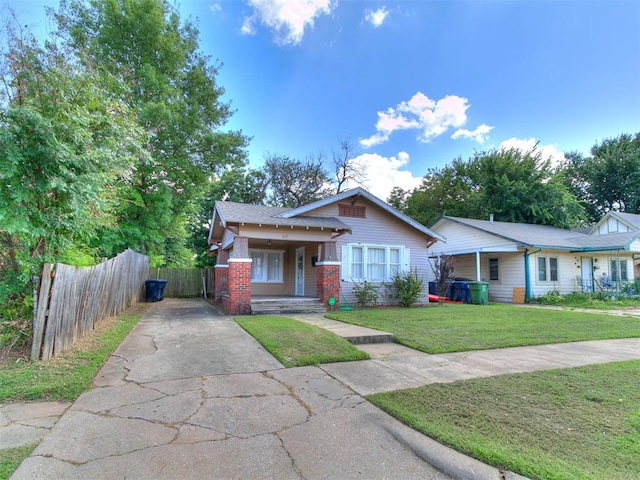 1122 NW 42nd St, Oklahoma City, OK 73118 - view of front of home with concrete driveway and covered porch