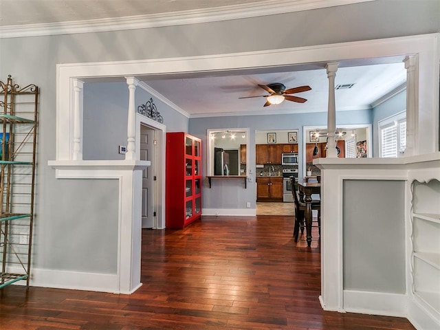 1122 NW 42nd St, Oklahoma City, OK 73118 - living area featuring dark wood-style flooring, crown molding, and ceiling fan