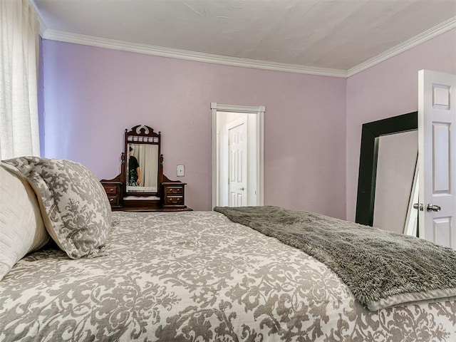 1122 NW 42nd St, Oklahoma City, OK 73118 - bedroom featuring crown molding