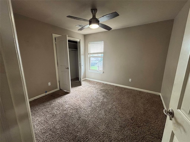 11321 NW 102nd St, Yukon, OK 73099 - unfurnished bedroom featuring carpet, ceiling fan, and a closet