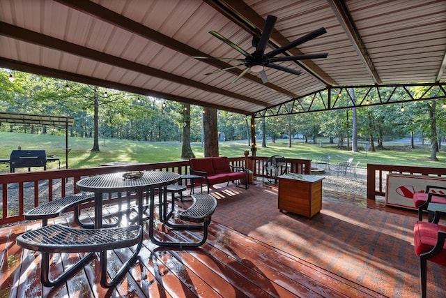 17 Halibut Bay Rd, Broken Bow, OK 74728 - wooden terrace with ceiling fan, a yard, view of scattered trees, and an outdoor living space