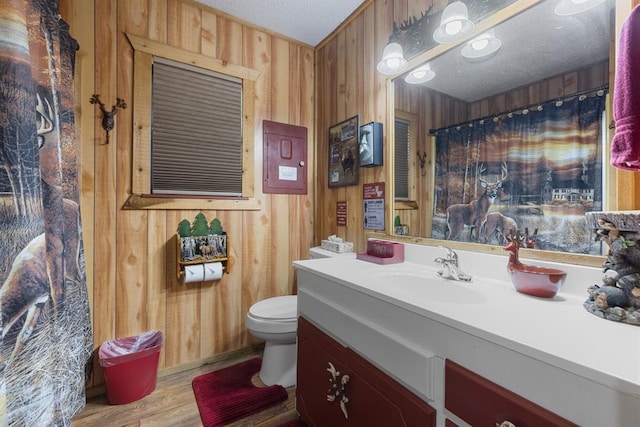 17 Halibut Bay Rd, Broken Bow, OK 74728 - full bathroom featuring vanity, wooden walls, and wood finished floors