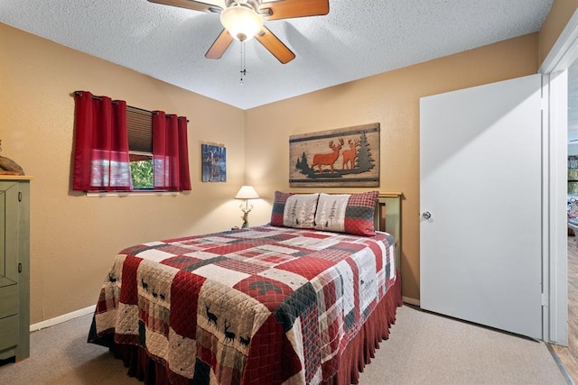 17 Halibut Bay Rd, Broken Bow, OK 74728 - bedroom featuring carpet flooring, a textured ceiling, and a ceiling fan
