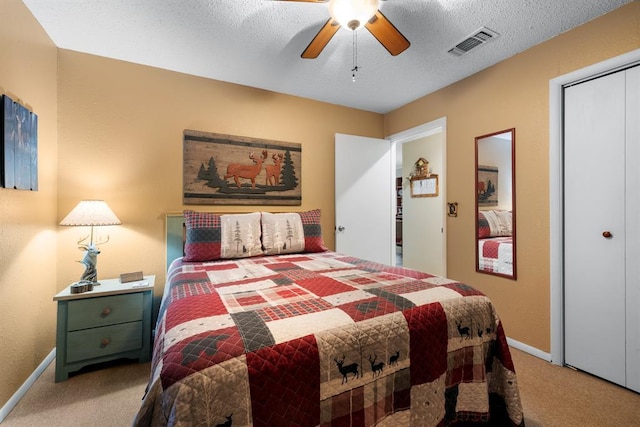 17 Halibut Bay Rd, Broken Bow, OK 74728 - bedroom featuring carpet, ceiling fan, a closet, and a textured ceiling
