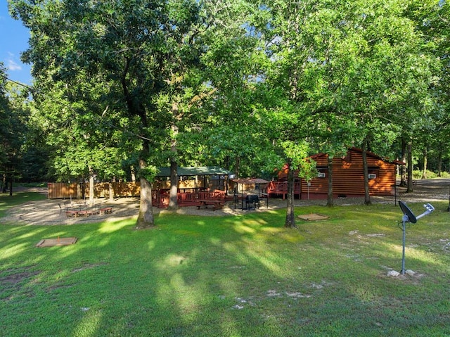 17 Halibut Bay Rd, Broken Bow, OK 74728 - view of green lawn featuring a deck