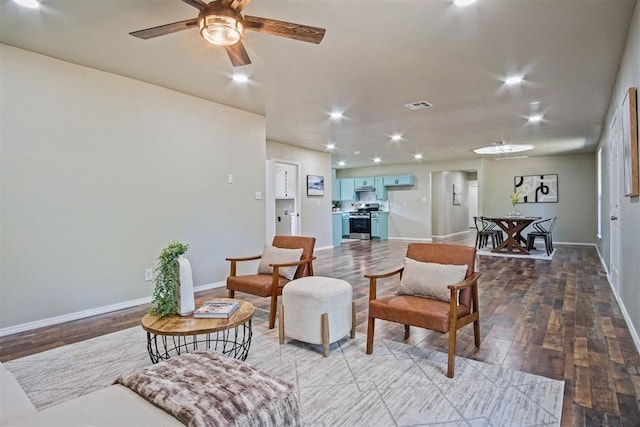 102078 S 3480th Rd, Meeker, OK 74855 - living area with a ceiling fan, wood finished floors, and recessed lighting