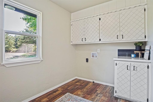 102078 S 3480th Rd, Meeker, OK 74855 - laundry room with cabinet space, dark wood-style flooring, and washer hookup