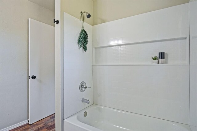 102078 S 3480th Rd, Meeker, OK 74855 - bathroom with wood finished floors and shower / bathtub combination