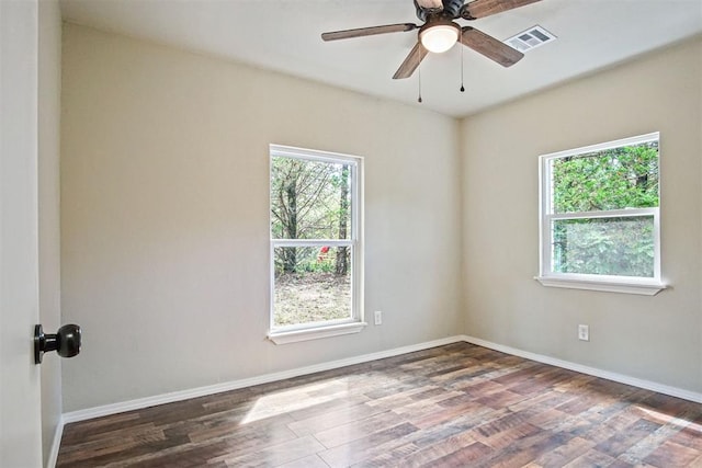 102078 S 3480th Rd, Meeker, OK 74855 - spare room featuring healthy amount of natural light, wood finished floors, and a ceiling fan