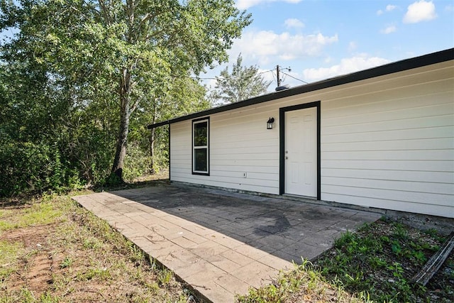 102078 S 3480th Rd, Meeker, OK 74855 - view of exterior entry with a patio