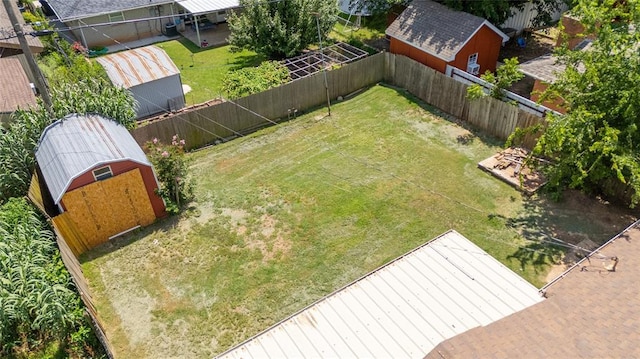 1512 SW 77th Ter, Oklahoma City, OK 73159 - fenced backyard featuring an outdoor structure