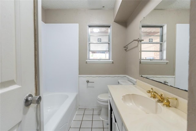 1512 SW 77th Ter, Oklahoma City, OK 73159 - full bathroom featuring tile patterned flooring, vanity, and a textured ceiling