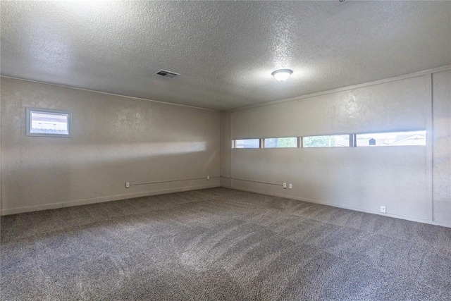 1512 SW 77th Ter, Oklahoma City, OK 73159 - unfurnished room featuring carpet floors and a textured ceiling