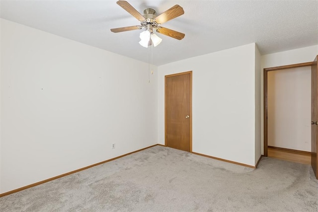 13722 NE 9th St, Choctaw, OK 73020 - unfurnished bedroom featuring light colored carpet, a closet, and ceiling fan