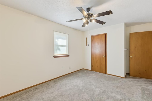 13722 NE 9th St, Choctaw, OK 73020 - unfurnished bedroom featuring carpet flooring and a ceiling fan