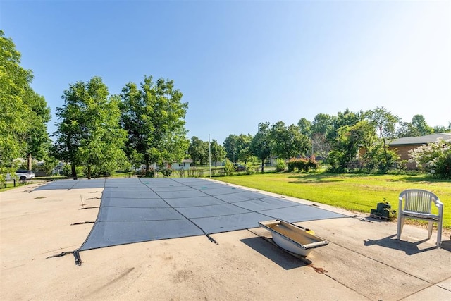 13722 NE 9th St, Choctaw, OK 73020 - view of pool with a patio area, a lawn, a covered pool, and view of scattered trees