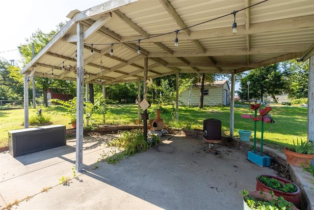 13722 NE 9th St, Choctaw, OK 73020 - view of patio / terrace featuring a carport
