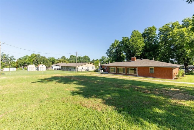 13722 NE 9th St, Choctaw, OK 73020 - view of yard with a shed