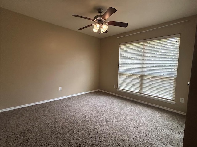 1108 SW 158th St, Oklahoma City, OK 73170 - carpeted empty room with a ceiling fan and healthy amount of natural light