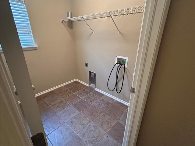 1108 SW 158th St, Oklahoma City, OK 73170 - washroom featuring washer hookup and dark stone finish floors