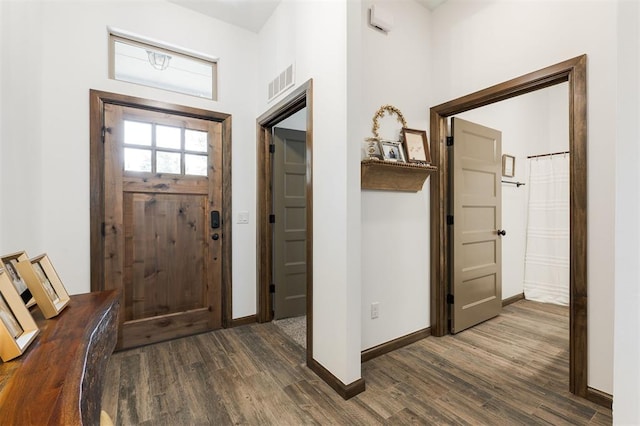13 Ivory Dr, Yukon, OK 73099 - entrance foyer featuring dark wood finished floors and a towering ceiling