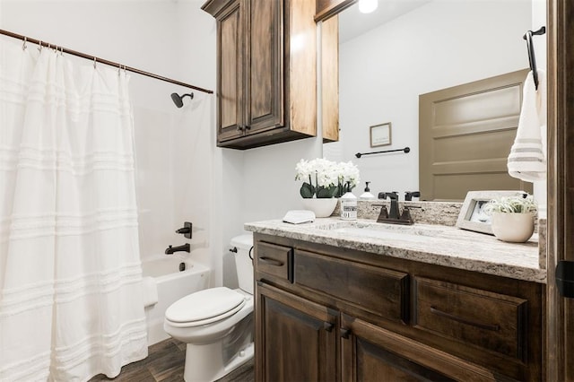 13 Ivory Dr, Yukon, OK 73099 - bathroom with wood finished floors, vanity, and shower / tub combo