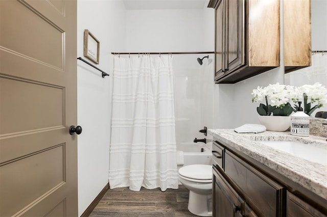 13 Ivory Dr, Yukon, OK 73099 - full bath featuring vanity, wood finished floors, and shower / tub combo