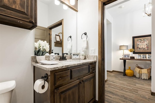 13 Ivory Dr, Yukon, OK 73099 - bathroom featuring wood finished floors and vanity