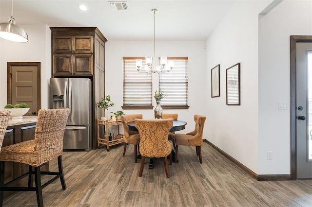 13 Ivory Dr, Yukon, OK 73099 - dining room with a chandelier, dark wood finished floors, and recessed lighting
