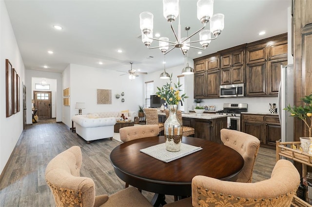 13 Ivory Dr, Yukon, OK 73099 - dining room with recessed lighting, a ceiling fan, wood finished floors, and a chandelier