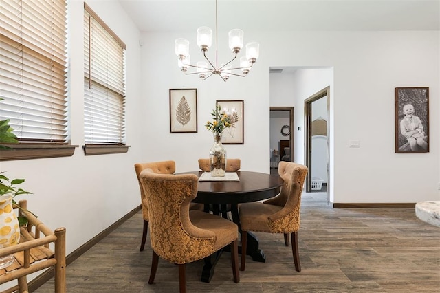 13 Ivory Dr, Yukon, OK 73099 - dining room featuring a chandelier and wood finished floors