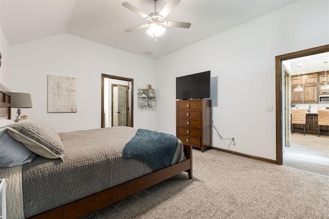 13 Ivory Dr, Yukon, OK 73099 - bedroom with light carpet, vaulted ceiling, and ceiling fan