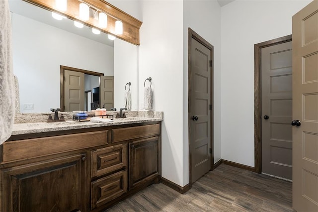 13 Ivory Dr, Yukon, OK 73099 - full bath featuring wood finished floors and double vanity