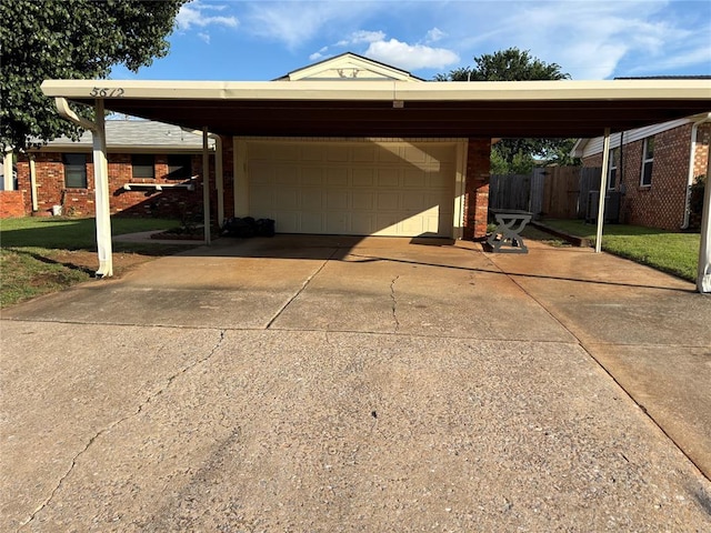 5612 NW 65th St, Warr Acres, OK 73132 - view of parking featuring driveway, an attached garage, and an attached carport