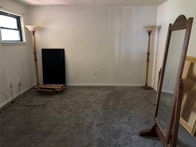 5612 NW 65th St, Warr Acres, OK 73132 - spare room featuring carpet and a textured ceiling