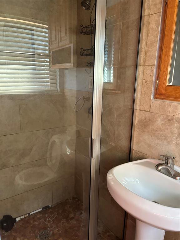 5612 NW 65th St, Warr Acres, OK 73132 - bathroom with a stall shower and tile walls