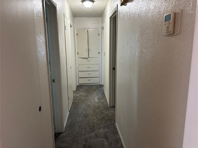 5612 NW 65th St, Warr Acres, OK 73132 - hallway with dark carpet and a textured wall