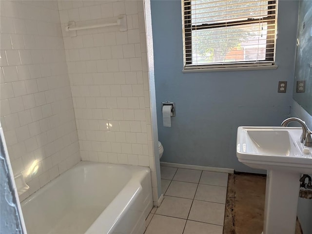 5612 NW 65th St, Warr Acres, OK 73132 - bathroom featuring tile patterned flooring and shower / tub combination