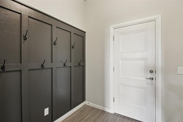 12825 SW 26th St, Yukon, OK 73099 - mudroom with wood finished floors and baseboards