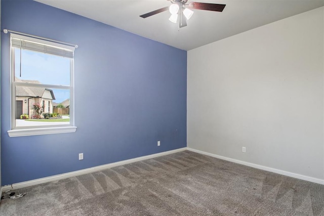 12825 SW 26th St, Yukon, OK 73099 - carpeted spare room with ceiling fan and baseboards